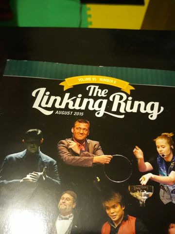 Cover of The Linking Ring magazine showing a group of magicians performing